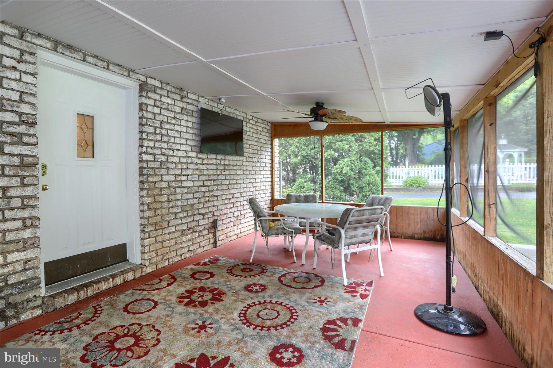 12 South Ridge Road Boiling Springs, PA 17007 - Photo 35 of 39 a living room with furniture and a flat screen tv
