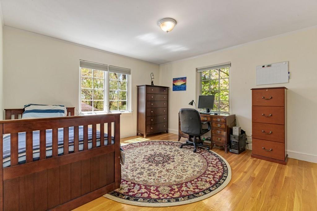 132 Beverly Road Brookline, MA 02467 - Photo 13 of 36 a view of a workspace with furniture and a window