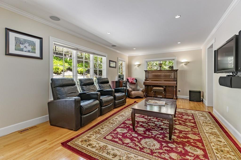 132 Beverly Road Brookline, MA 02467 - Photo 33 of 36 a living room with furniture and a flat screen tv
