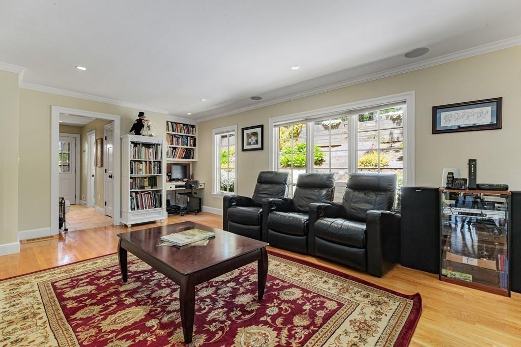 132 Beverly Road Brookline, MA 02467 - Photo 5 of 36 a living room with furniture a rug and a window
