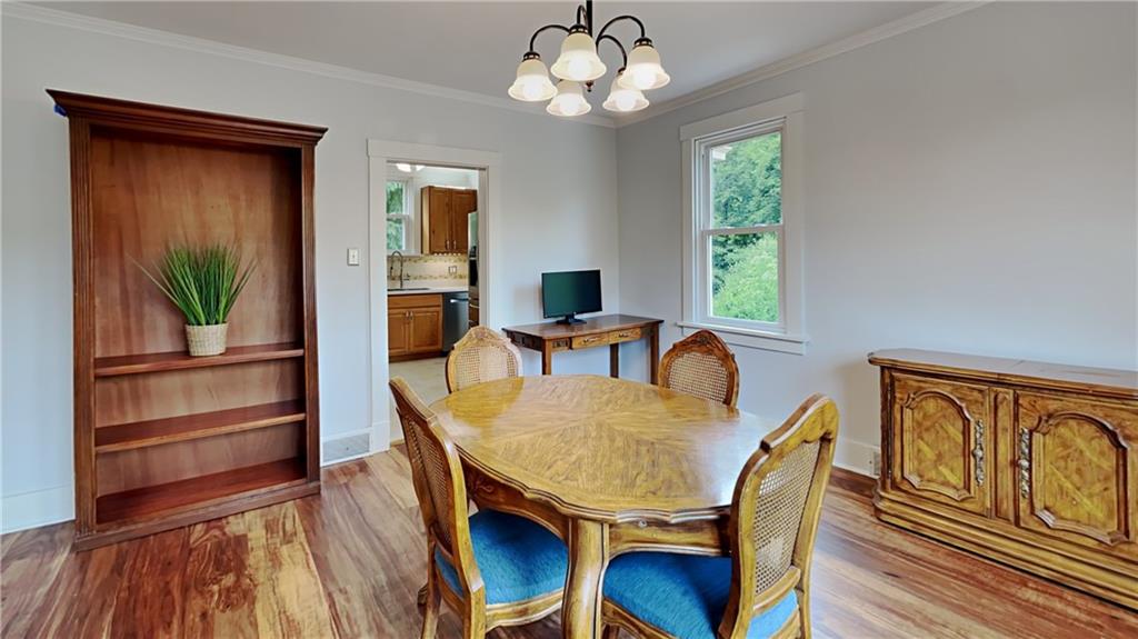9735 Valley View Road Pittsburgh, PA 15237 - Photo 8 of 25 a view of a dining room with furniture window and wooden floor