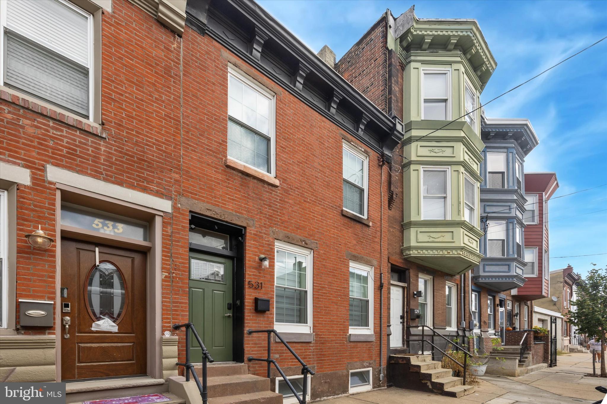 a view of a building with a street