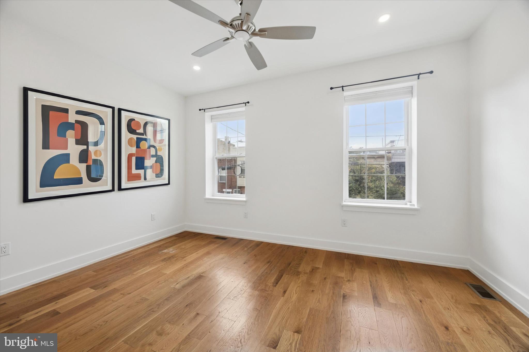 531 Mifflin Street Philadelphia, PA 19148 - Photo 21 of 28 a view of empty room with wooden floor and fan