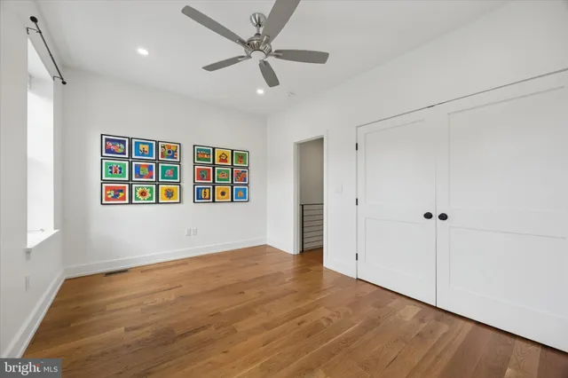 a view of entryway with wooden floor