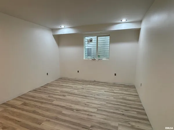 a view of a room with windows