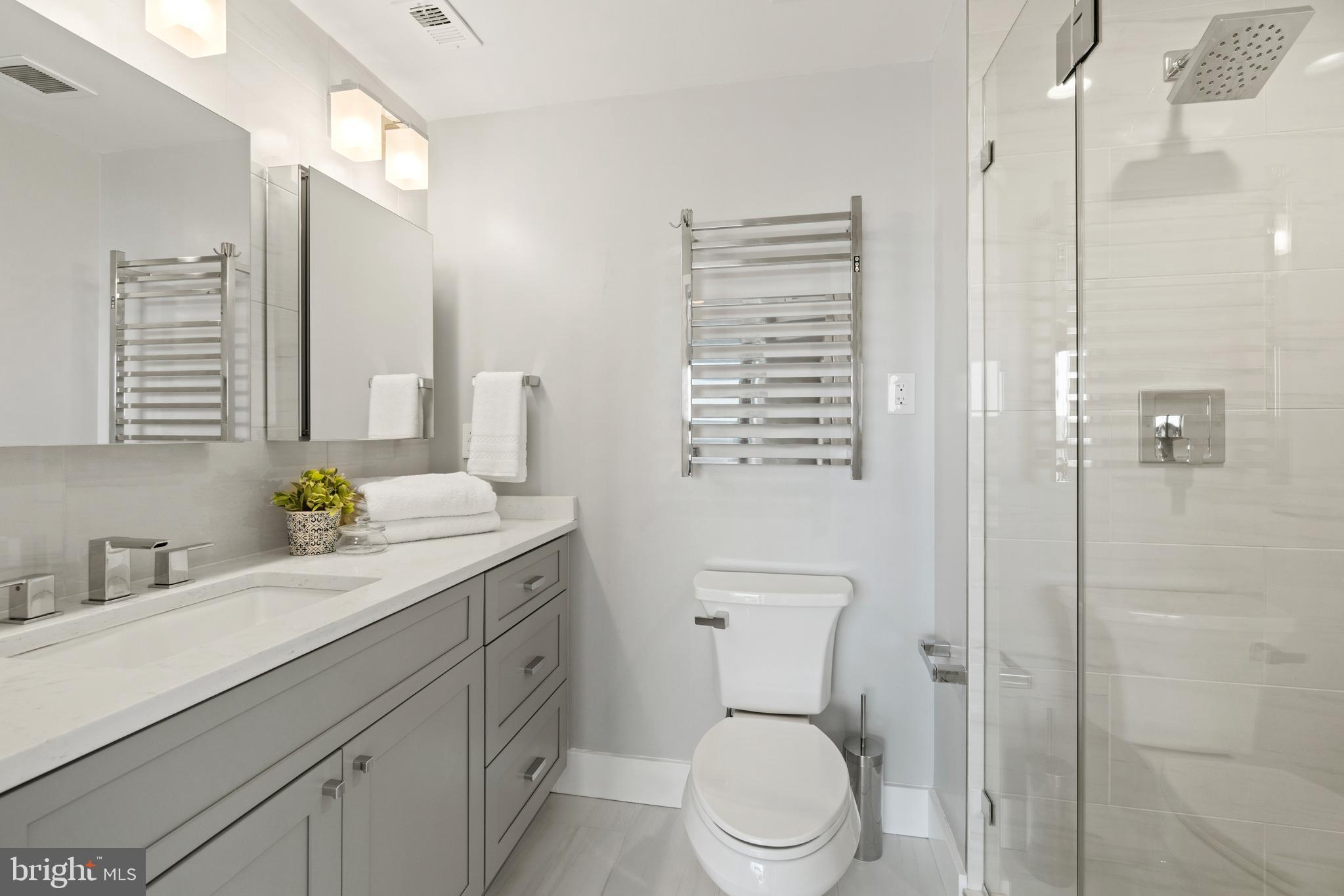 3039 16th Street Northwest, Unit 401 Washington, DC 20009 - Photo 13 of 25 Updated ensuite owner's bathroom