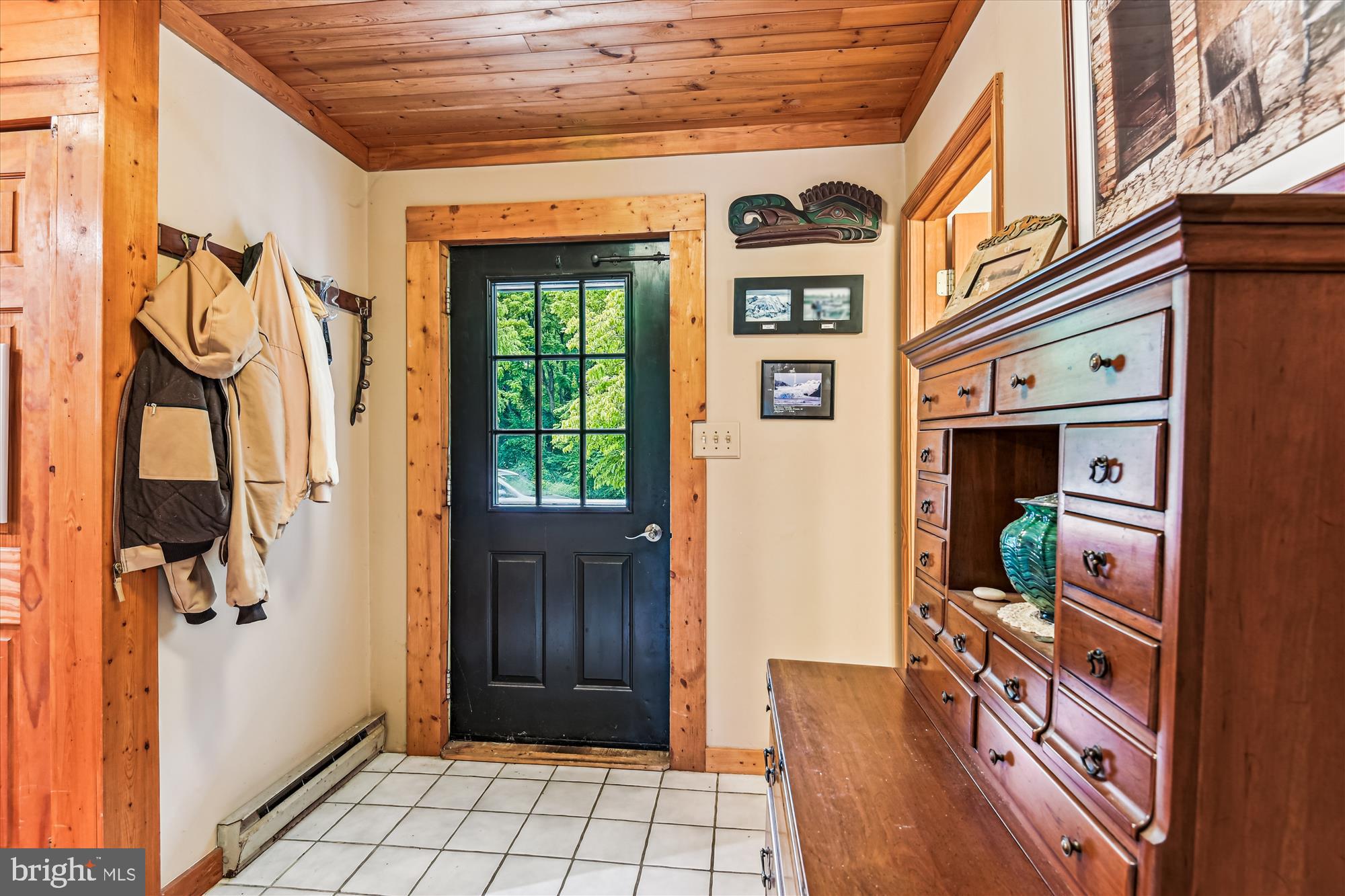 4441 Solomons Island Road Harwood, MD 20776 - Photo 16 of 87 Tiled Foyer Introducing Natural Pine Millwork