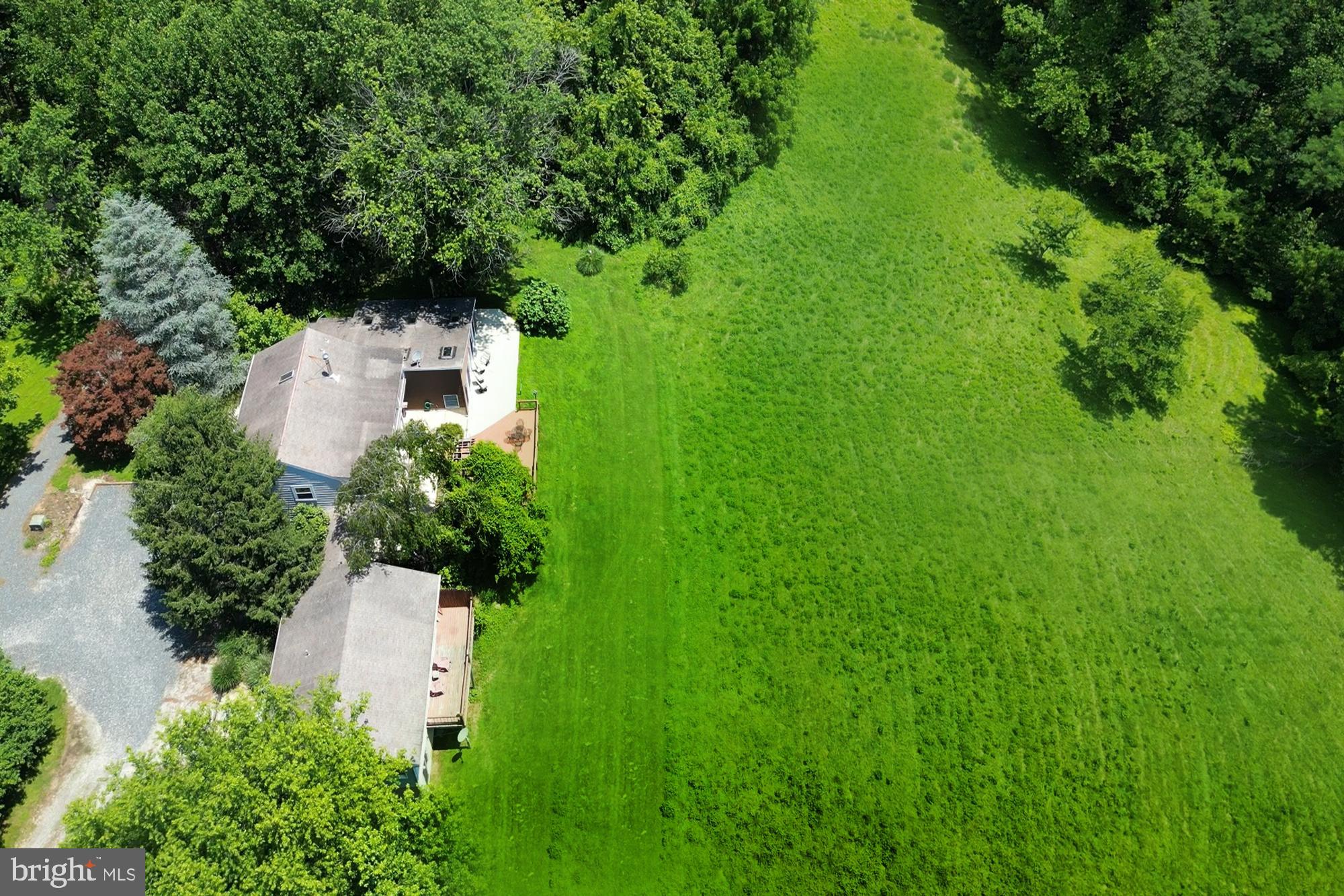 4441 Solomons Island Road Harwood, MD 20776 - Photo 3 of 87 an aerial view of a house with a yard