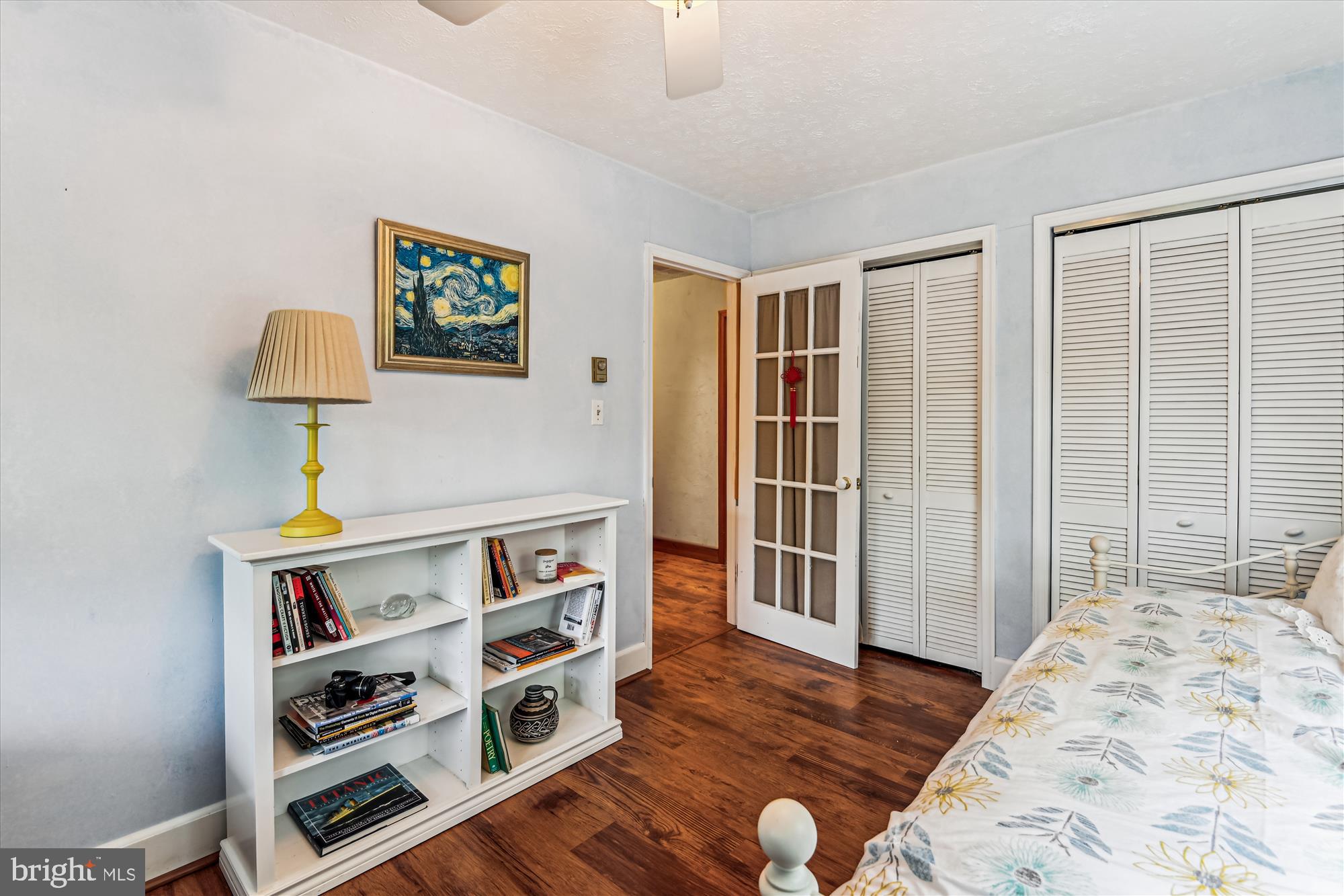 4441 Solomons Island Road Harwood, MD 20776 - Photo 46 of 87 a view of a bedroom with wooden floor and closet