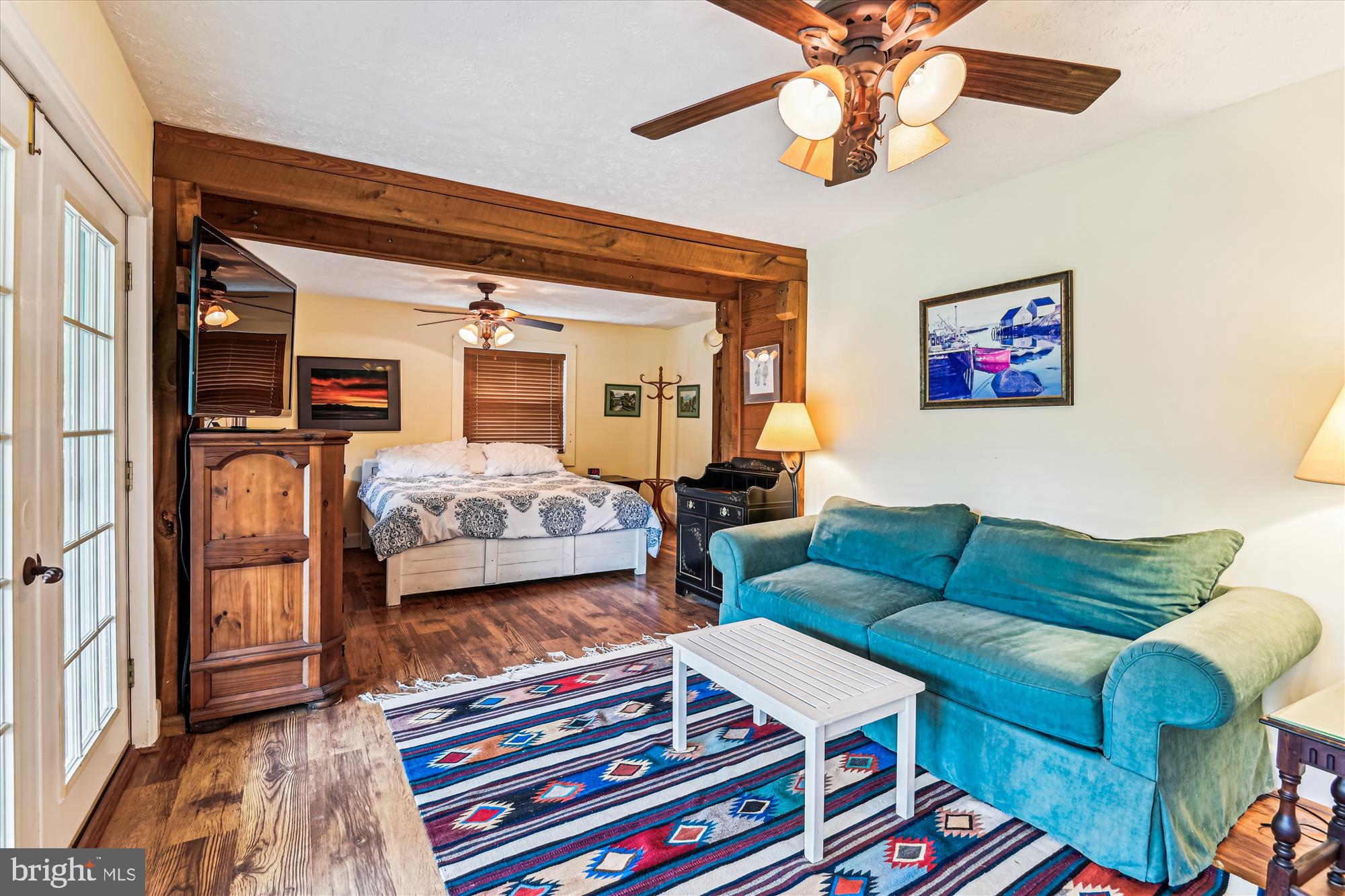 4441 Solomons Island Road Harwood, MD 20776 - Photo 52 of 87 a bedroom with furniture and a rug