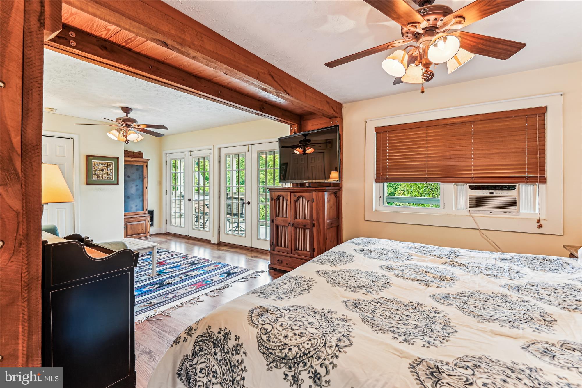 4441 Solomons Island Road Harwood, MD 20776 - Photo 53 of 87 a bedroom with a bed dresser and a window