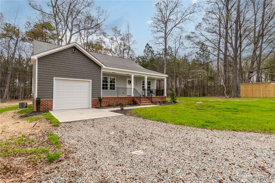 24702 River Road Petersburg, VA 23803 - Photo 3 of 31 Ranch-style house featuring a front lawn, driveway