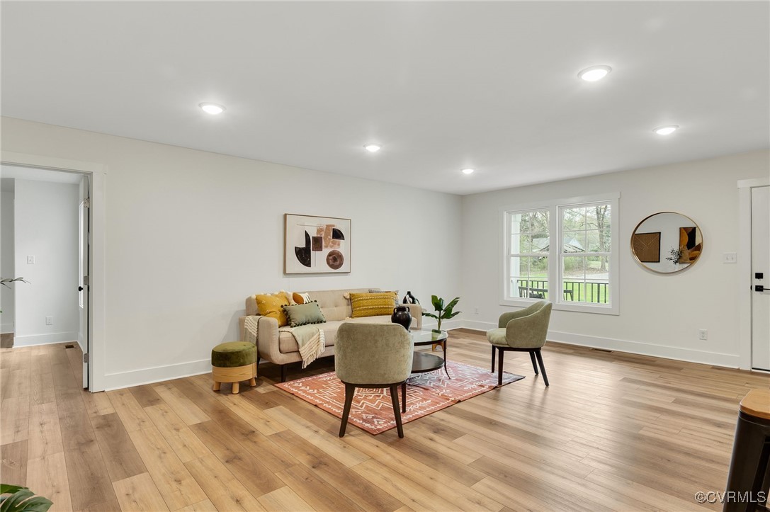 24702 River Road Petersburg, VA 23803 - Photo 8 of 31 Living area with recessed lighting and light LVP w