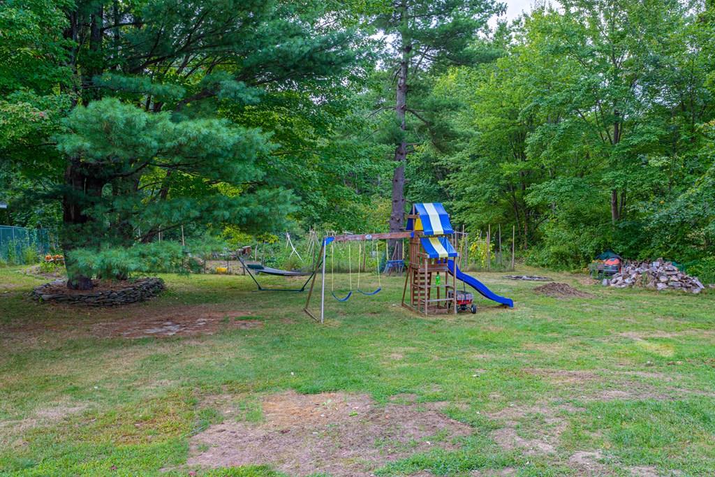 202 Whalom Road Lunenburg, MA 01462 - Photo 31 of 42 a view of a park with swings