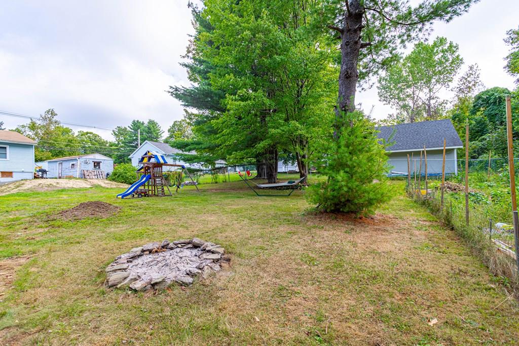 202 Whalom Road Lunenburg, MA 01462 - Photo 34 of 42 a view of a yard with palm trees