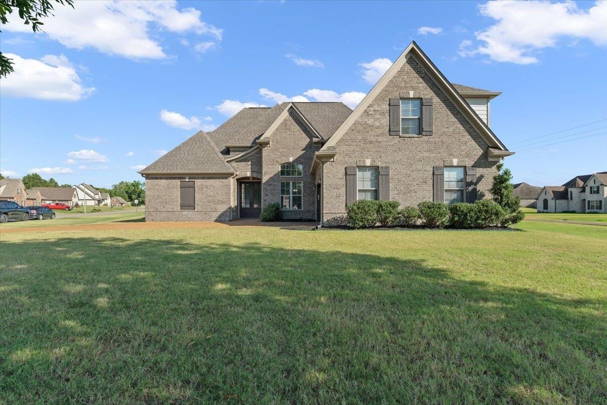 1739 Treestand Road Southaven, MS 38672 - Photo 2 of 27 a front view of house with yard and green space