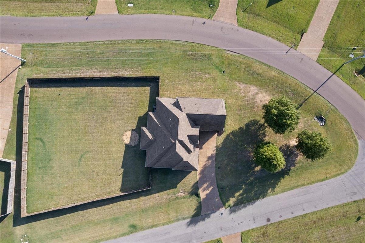 1739 Treestand Road Southaven, MS 38672 - Photo 25 of 27 an aerial view of a house with a yard