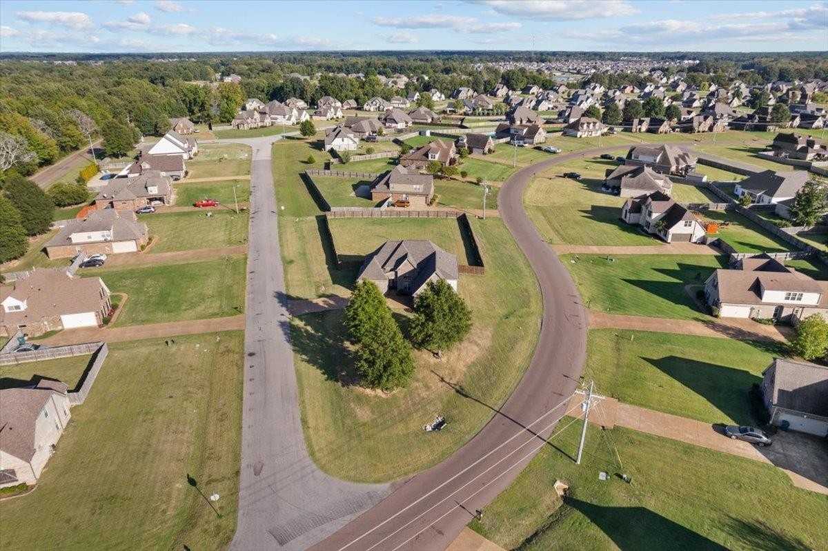 1739 Treestand Road Southaven, MS 38672 - Photo 27 of 27 an aerial view of a house with a swimming pool