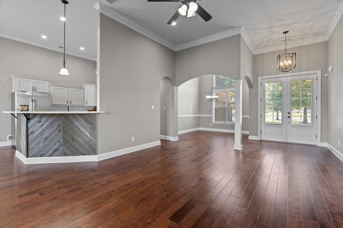 1739 Treestand Road Southaven, MS 38672 - Photo 4 of 27 a view of a kitchen with a fridge and wooden floor