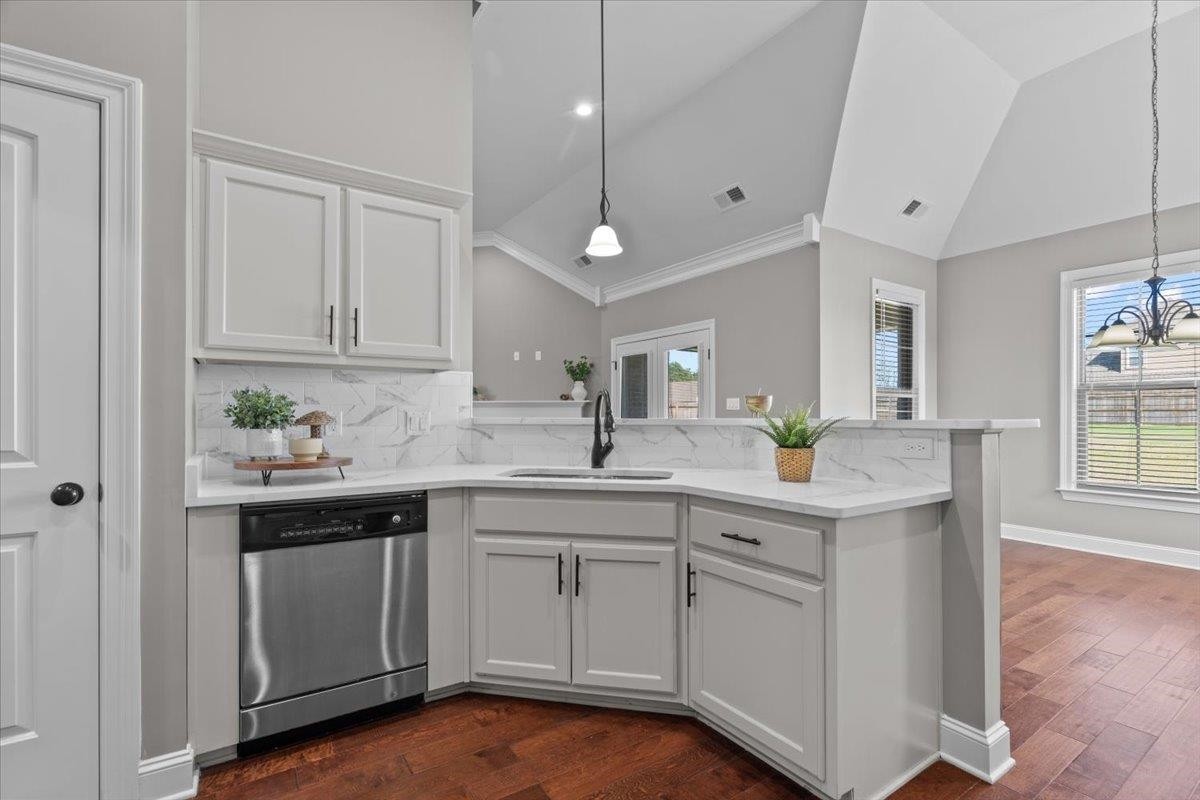1739 Treestand Road Southaven, MS 38672 - Photo 7 of 27 a kitchen with white cabinets and sink