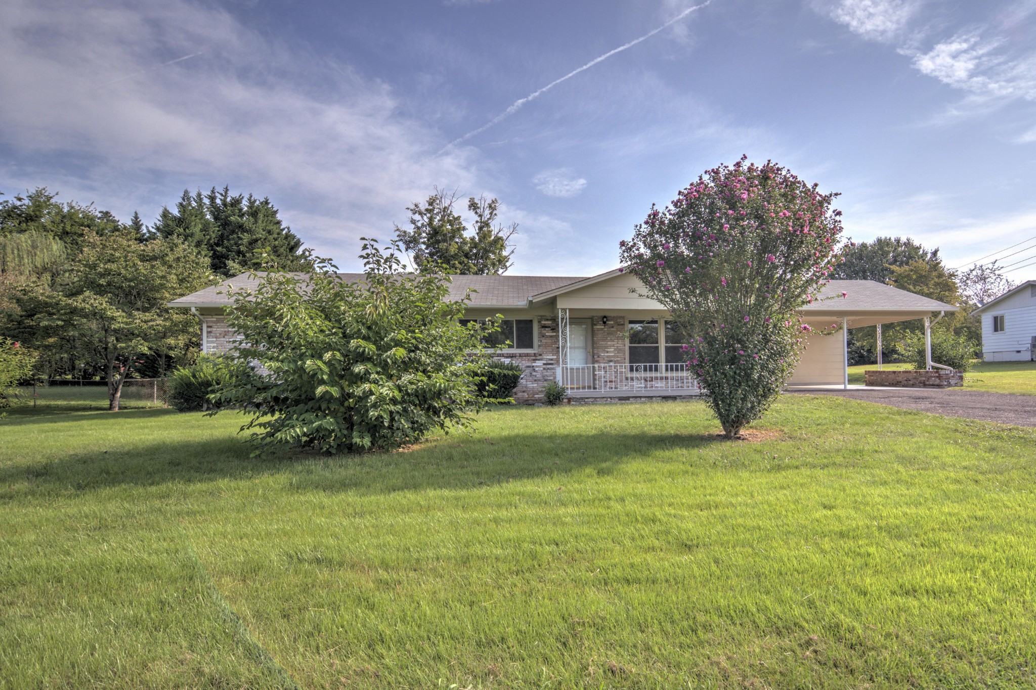4309 Royalview Road Knoxville, TN 37921 - Photo 3 of 29 a front view of a house with a garden