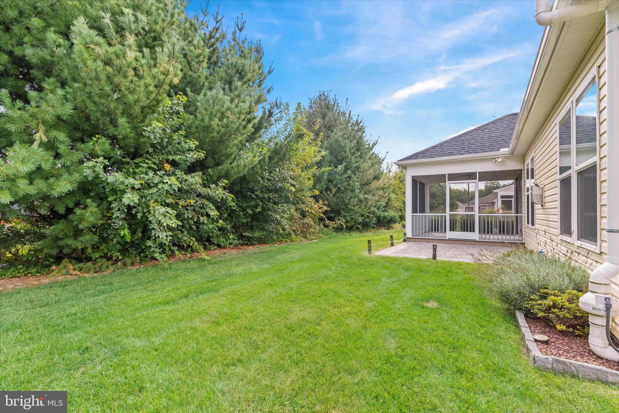 102 Rittenhouse Drive Dover, DE 19904 - Photo 34 of 41 Backyard with patio off screened in porch