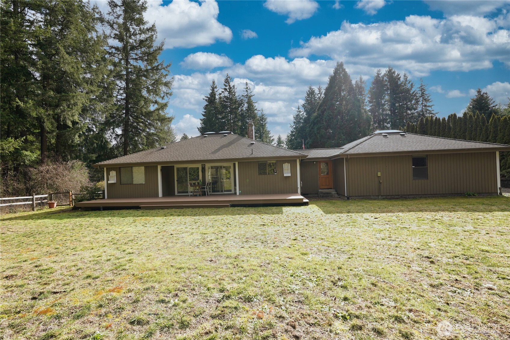 6511 255th St Court East Graham, WA 98338 - Photo 19 of 20 a front view of a house with a yard