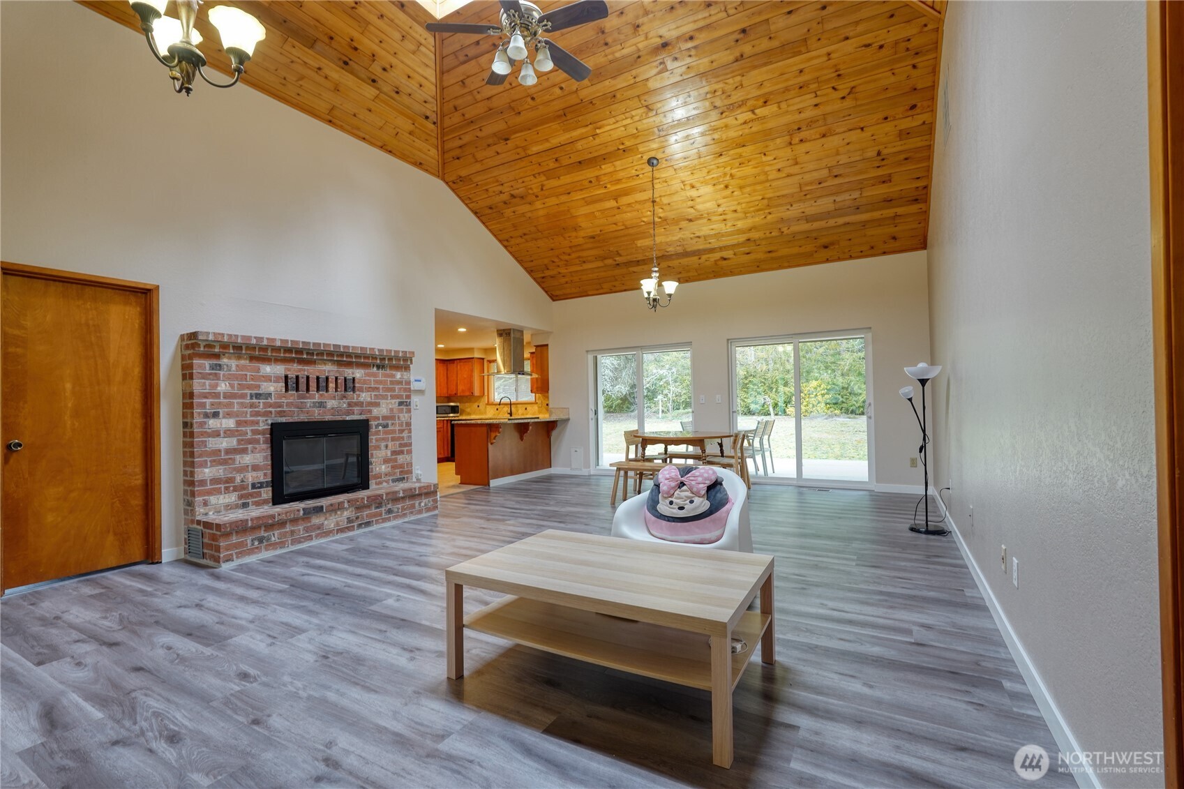 6511 255th St Court East Graham, WA 98338 - Photo 5 of 20 a view of a livingroom with furniture and a fireplace