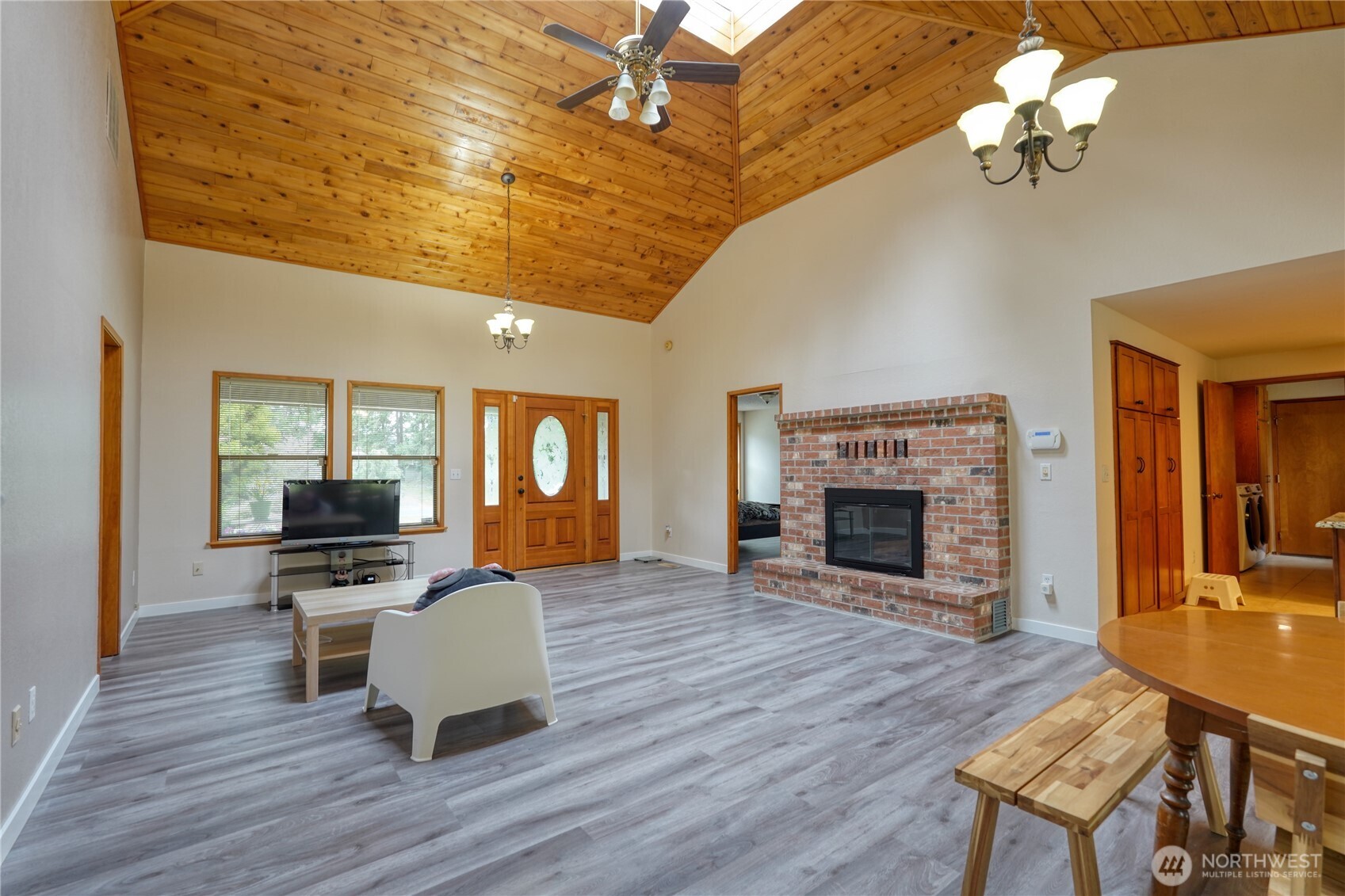 6511 255th St Court East Graham, WA 98338 - Photo 6 of 20 a living room with furniture fireplace and flat screen tv