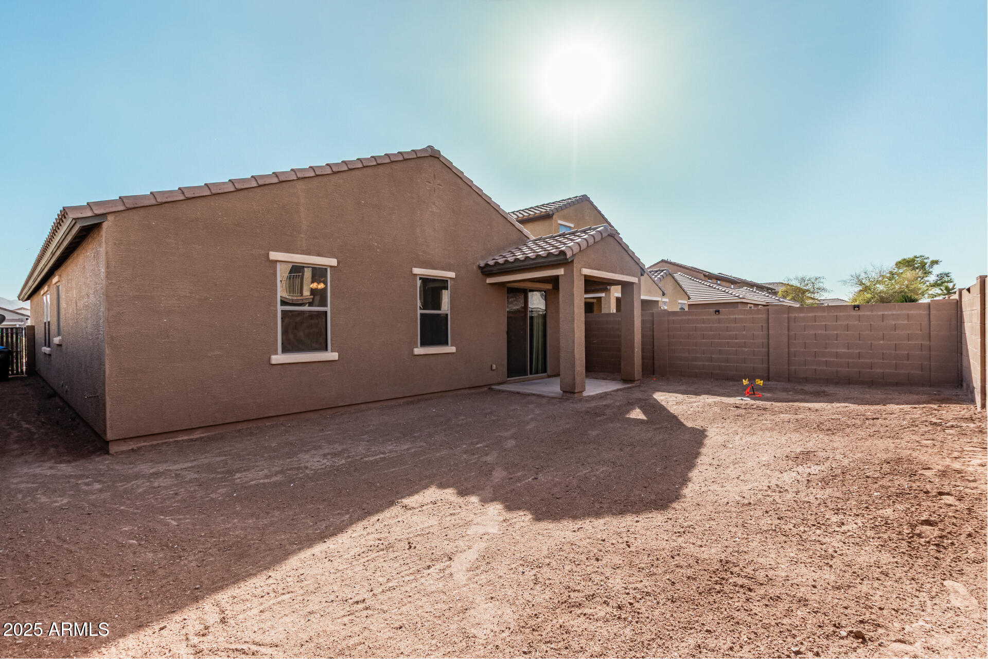 2530 West Gaby Road Phoenix, AZ 85041 - Photo 29 of 30 a view of a house with wooden fence