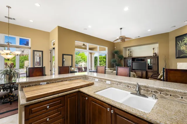 a view of a swimming pool with a lounge chairs