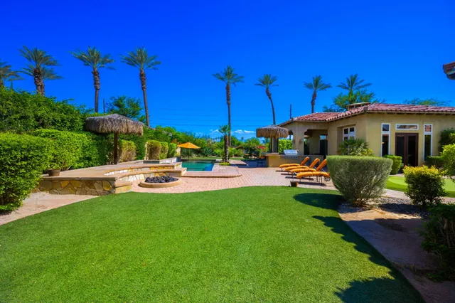 a bathroom with a tub a sink and a shower