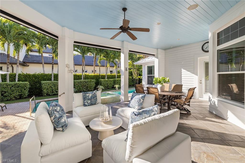 642 Bougainvillea Road Naples, FL 34102 - Photo 20 of 50 View of patio / terrace featuring outdoor lounge area, outdoor dining area, and a ceiling fan