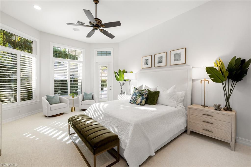 642 Bougainvillea Road Naples, FL 34102 - Photo 24 of 50 Bedroom with light colored carpet, a ceiling fan, and recessed lighting