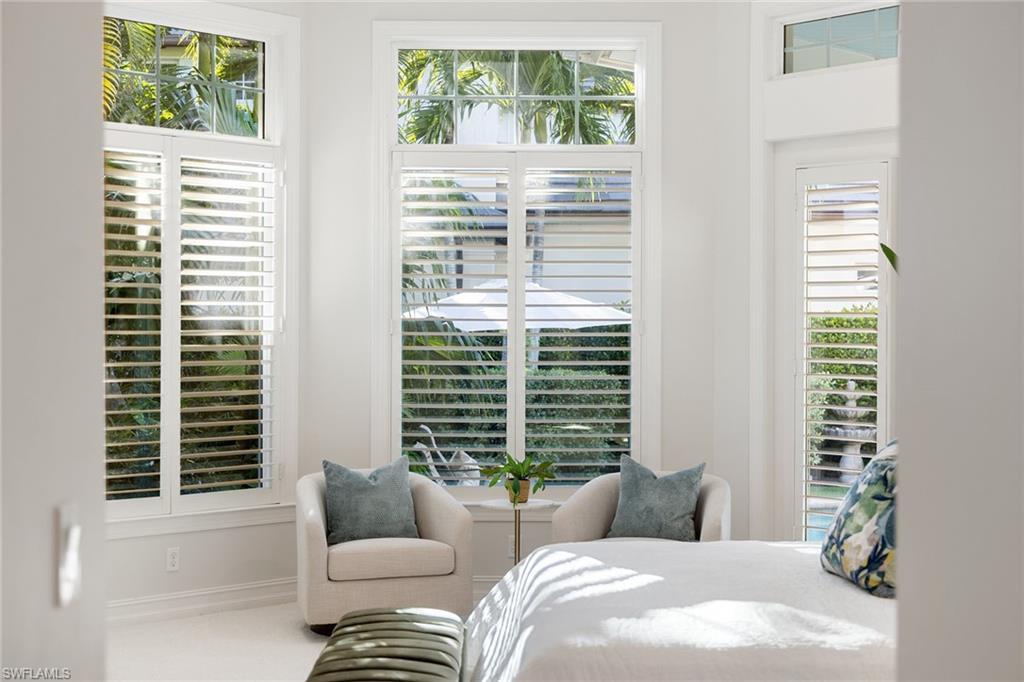 642 Bougainvillea Road Naples, FL 34102 - Photo 26 of 50 Carpeted bedroom featuring baseboards