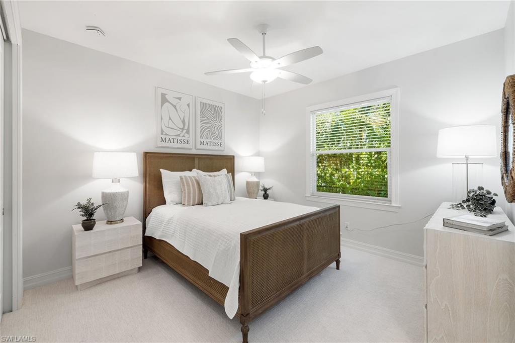 642 Bougainvillea Road Naples, FL 34102 - Photo 35 of 50 Carpeted bedroom featuring baseboards and a ceiling fan