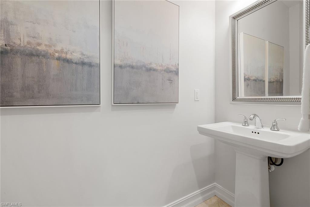 642 Bougainvillea Road Naples, FL 34102 - Photo 39 of 50 Bathroom with baseboards