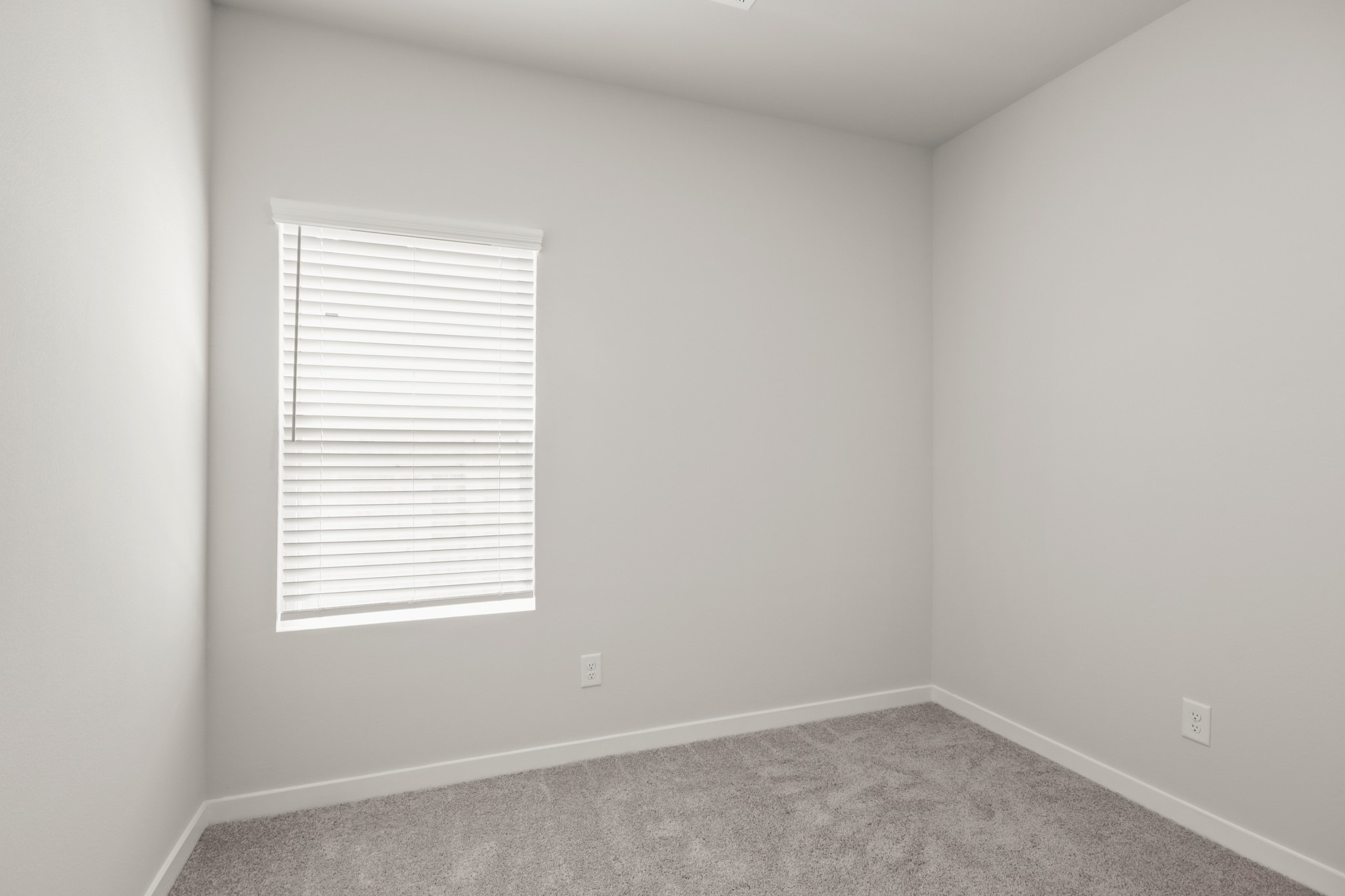 17859 Lionheart Road Conroe, TX 77306 - Photo 16 of 23 an empty room with a window
