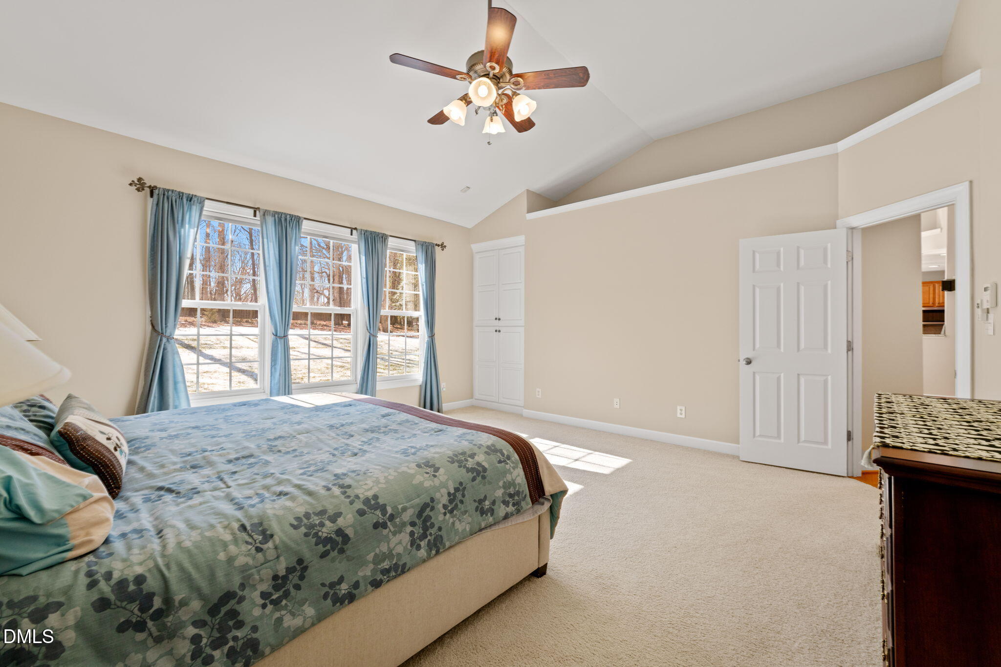 1009 Hidden River Court Raleigh, NC 27614 - Photo 16 of 40 a bedroom with a bed next to a window