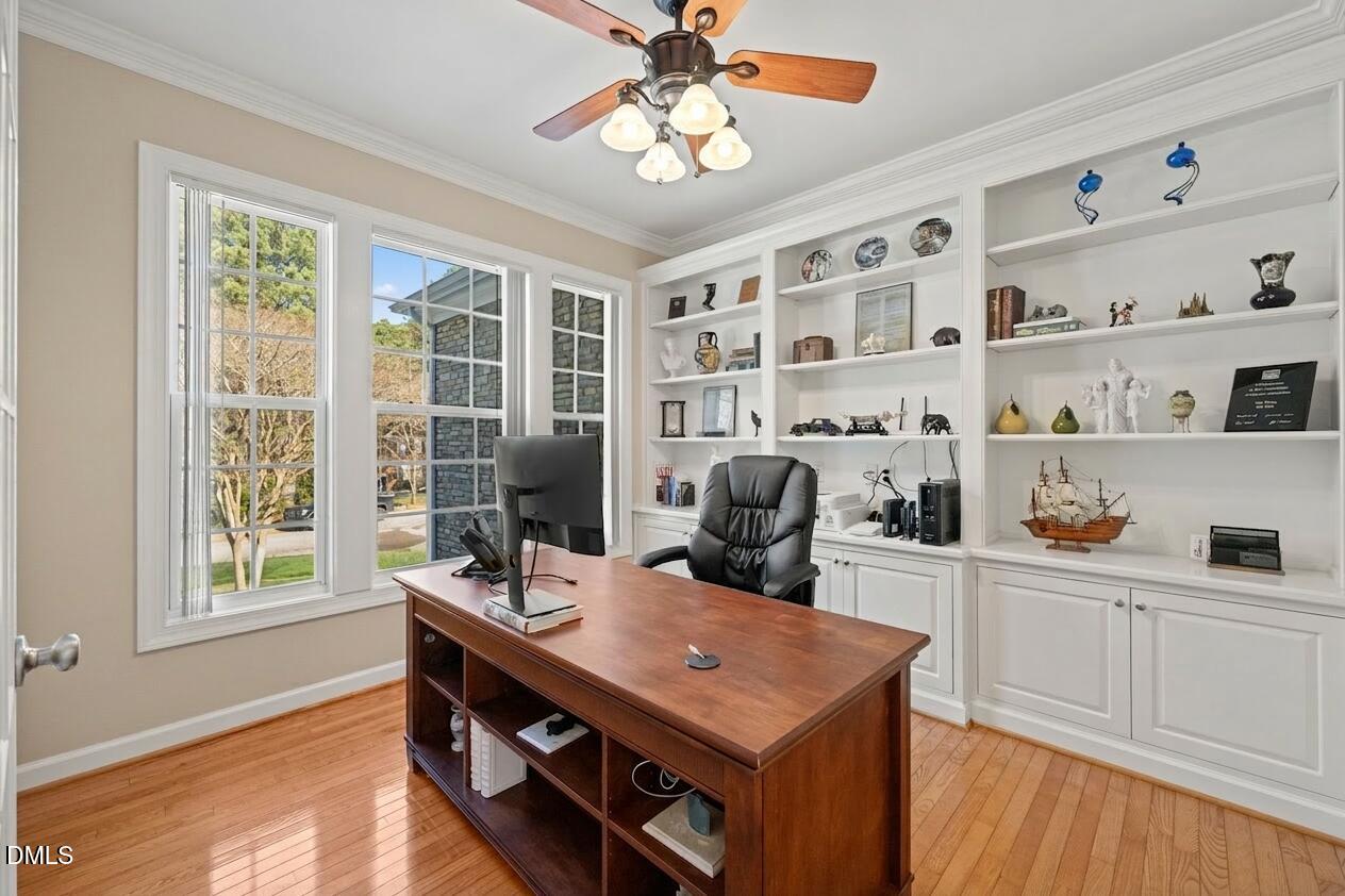 1009 Hidden River Court Raleigh, NC 27614 - Photo 7 of 40 a view of a kitchen area with furniture and chandelier
