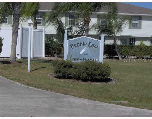 26386 Nadir Road, Unit 401 Punta Gorda, FL 33983 - Photo 1 of 1 a sign on the side of a building