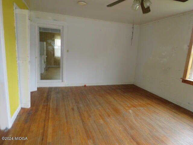 7367 Columbus Road Lizella, GA 31052 - Photo 7 of 12 a view of empty room with wooden floor