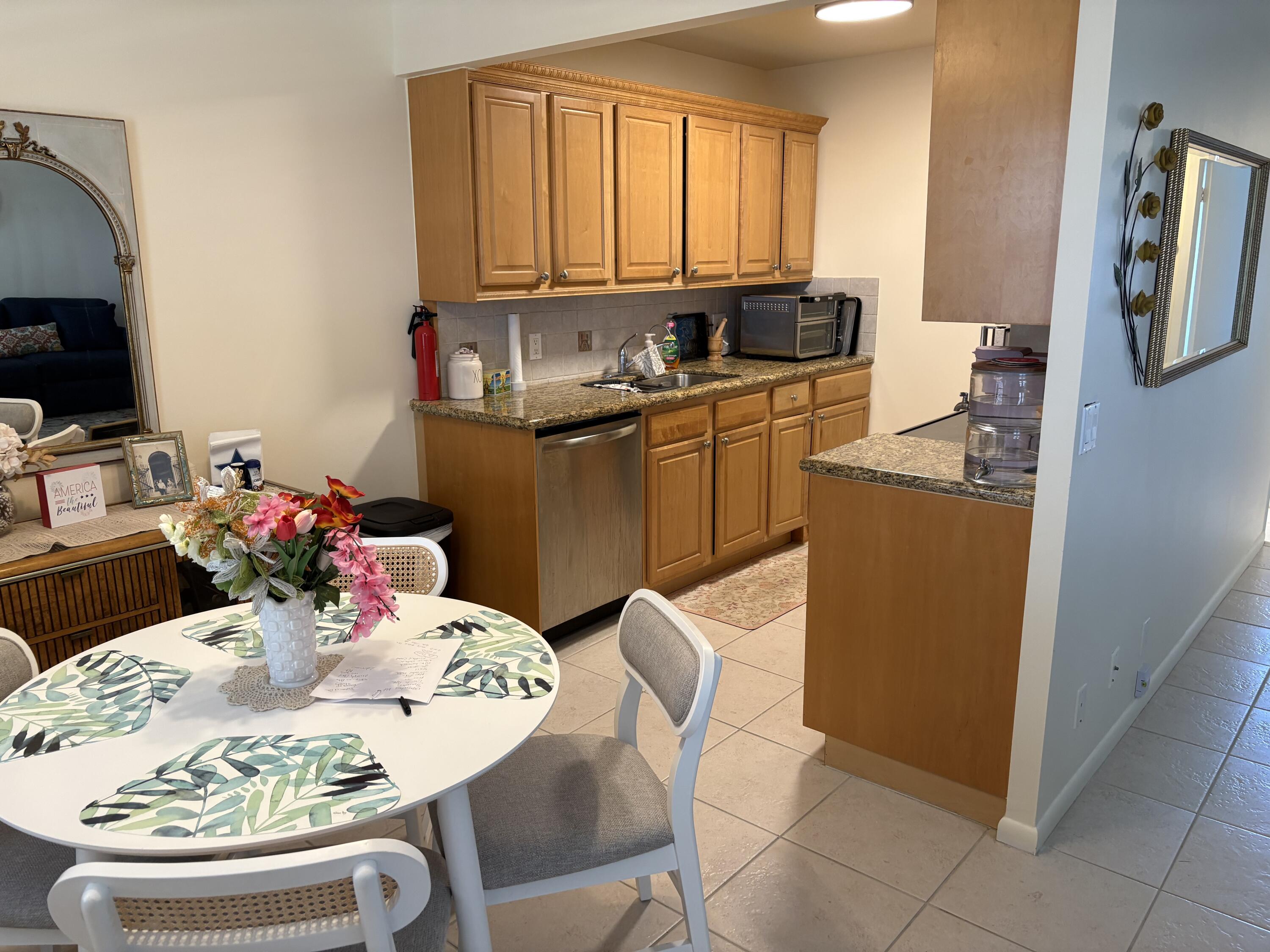 4070 Guildford East Boca Raton, FL 33434 - Photo 5 of 22 DINING AREA/KITCHEN