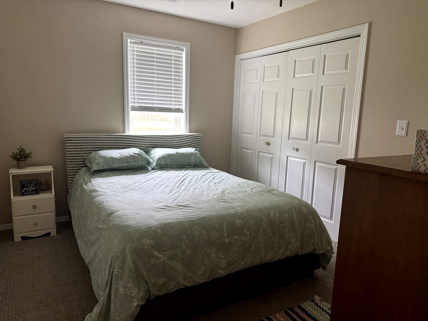 202 Front Street Malden, IL 61337 - Photo 12 of 17 a bedroom with a bed and a window