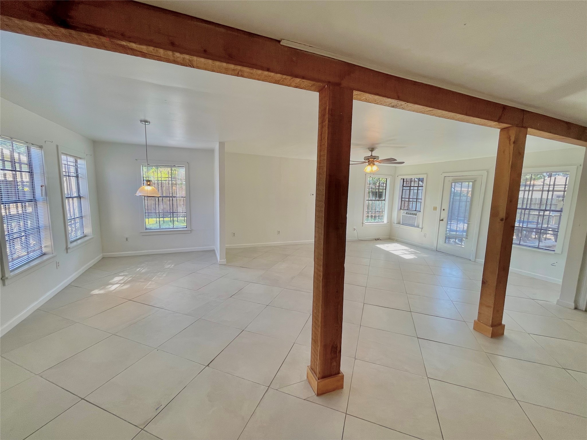 11606 Sagehurst Lane Houston, TX 77089 - Photo 6 of 13 a view of a hallway with wooden floor and a living room