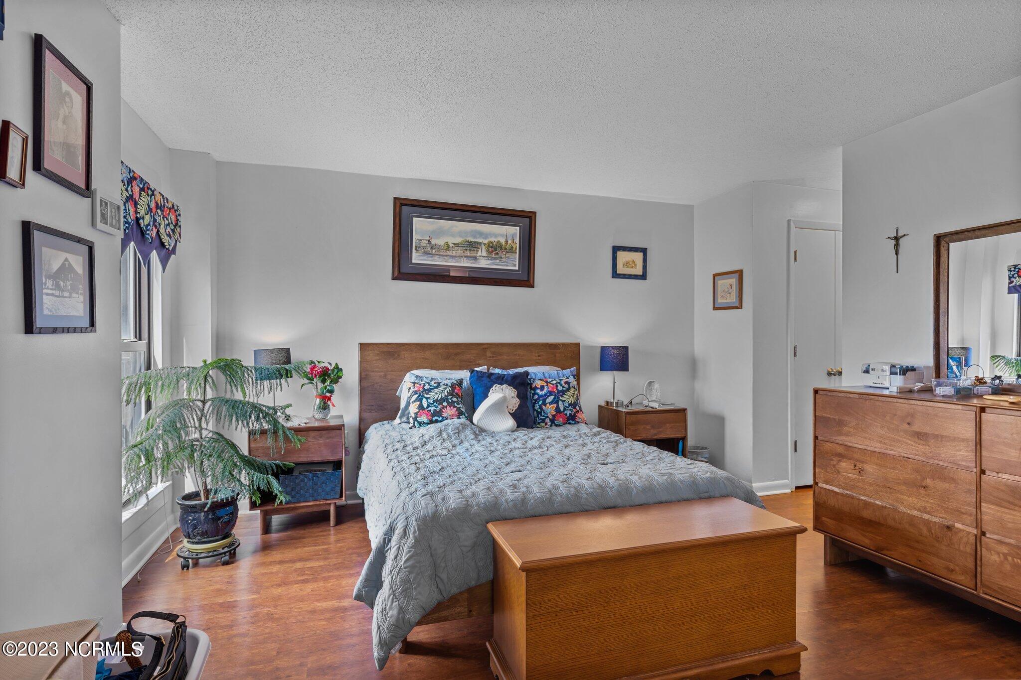 1505 Salter Path Road, Unit 238 Indian Beach, NC 28512 - Photo 22 of 49 Master bedroom with bathroom