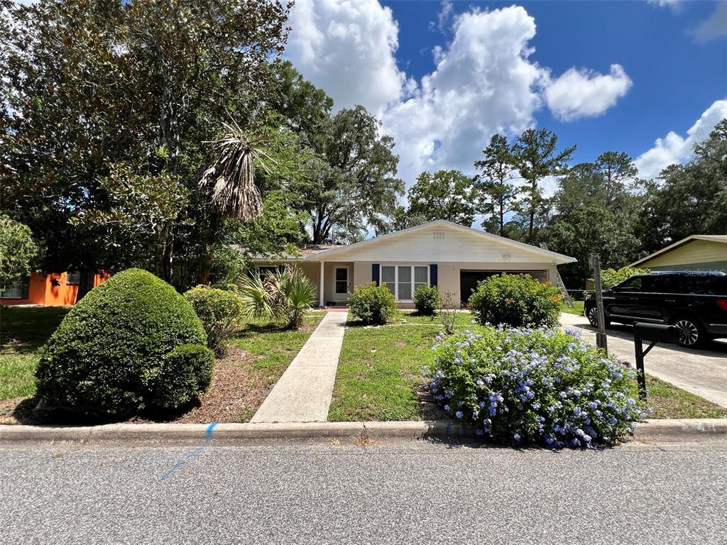 2240 Northwest 14th Avenue Gainesville, FL 32605 - Photo 1 of 13 a view of a garden with plants