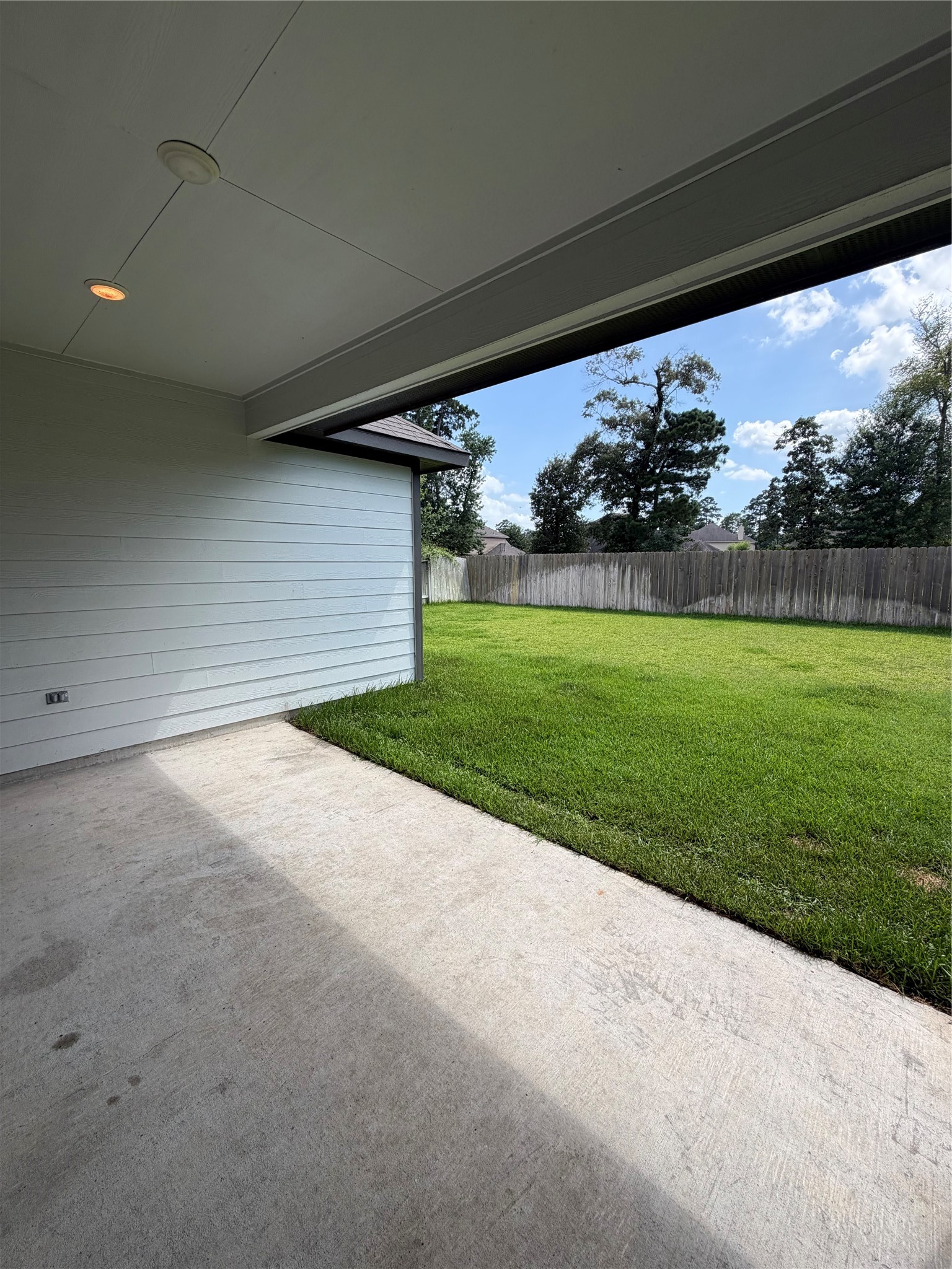 14162 Primrose Ridge Lane Conroe, TX 77384 - Photo 35 of 36 back yard patio