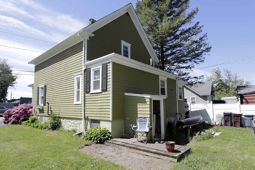 5 Anthony Street Acushnet, MA 02743 - Photo 6 of 37 a front view of a house with garden