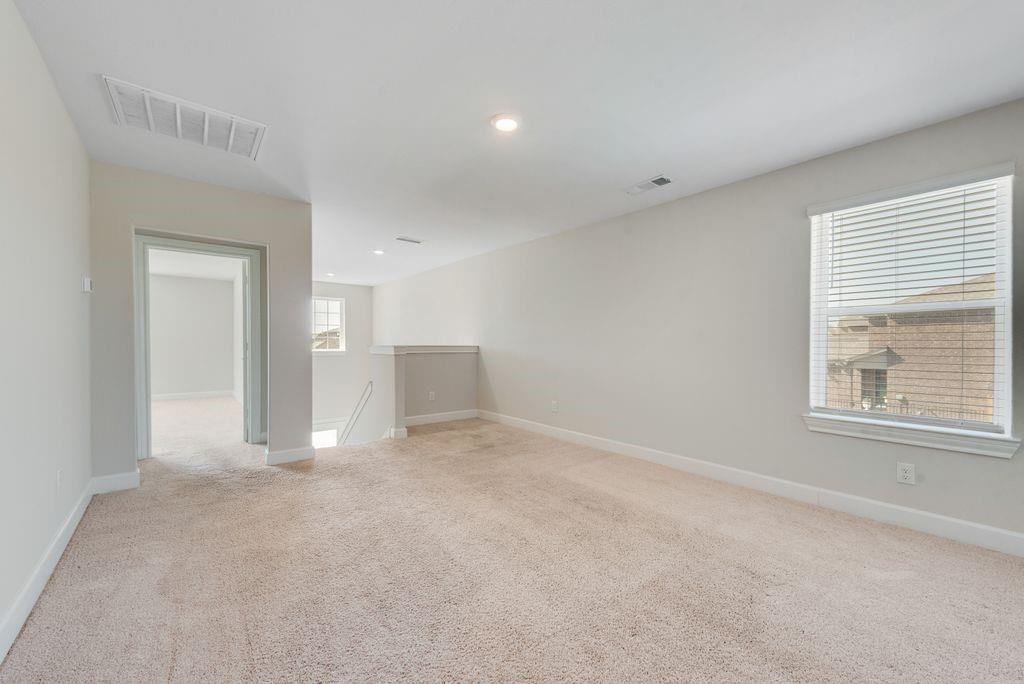 1421 Butler Avenue Princeton, TX 75407 - Photo 16 of 25 a view of an empty room with a window